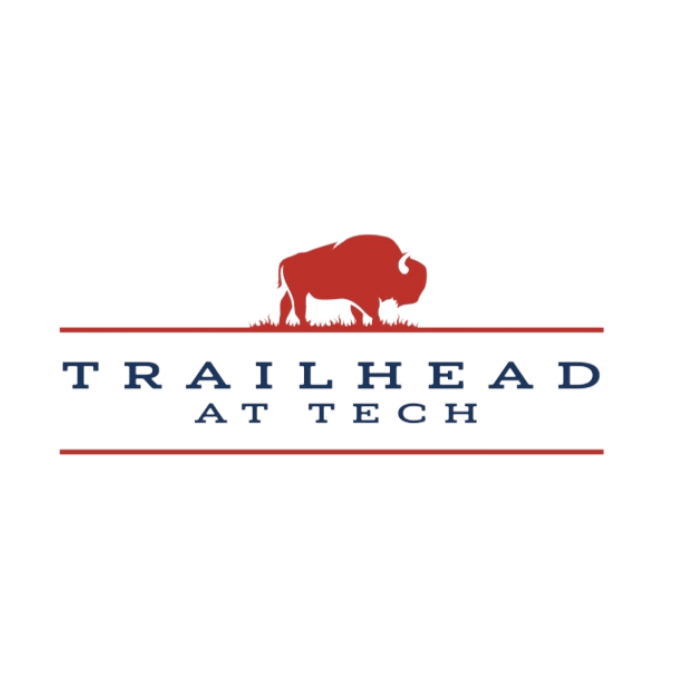 A buffalo silhouette is in front of the words "Trailhead at Tech".